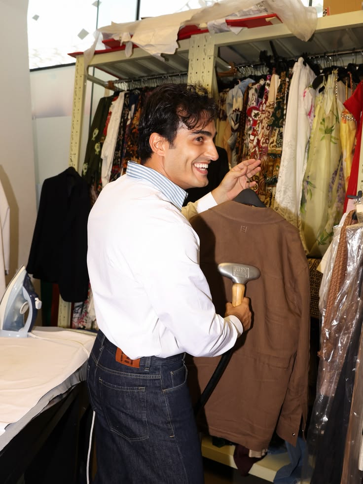 Ali Hennaoui steaming a Fendi jacket in a Dubai
      atelier — Fendi campaign by Ali & Walaa (@aliandwalaa)