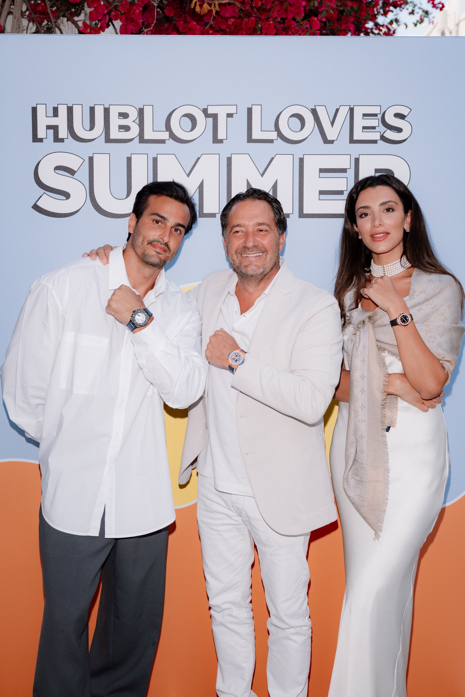 Ali Hennaoui and Walaa Awada with a Hublot representative
    at the Hublot Loves Summer launch in Mykonos, Greece — the trip
    that marked Ali & Walaa signing with Hublot, June 2025
