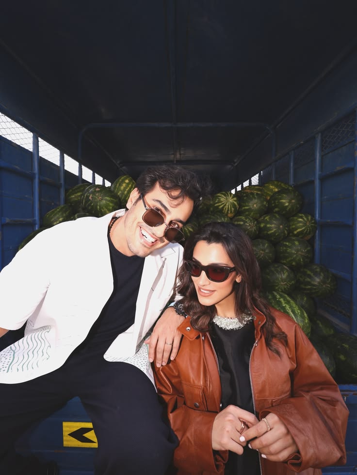 Ali Hennaoui and Walaa Awada in Prada Spring-Summer 2026
    at the back of a watermelon delivery truck, Ras Al Khor market
    Dubai — Prada campaign content by Ali & Walaa (@aliandwalaa),
    February 2026. Luxury fashion editorial moodboard reference.